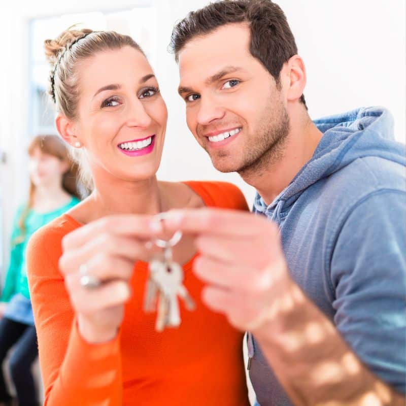 couple holding keys