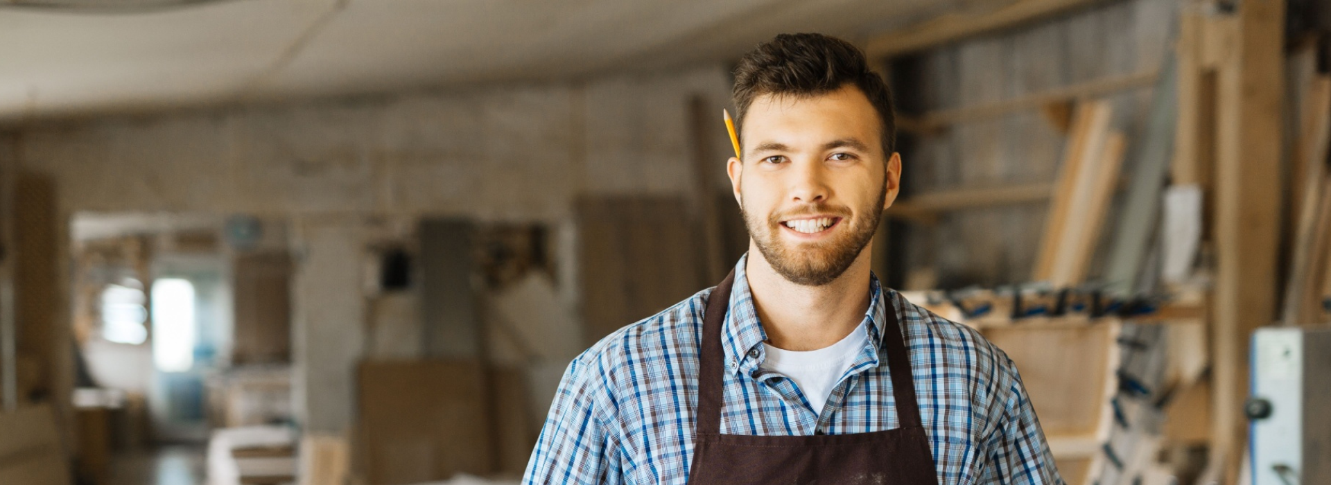 Self-employed carpenter in workshop considering home loan options