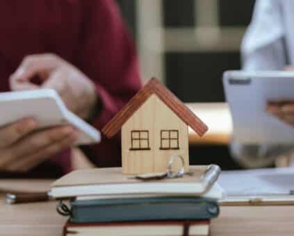reviewing a property valuation report together at a desk